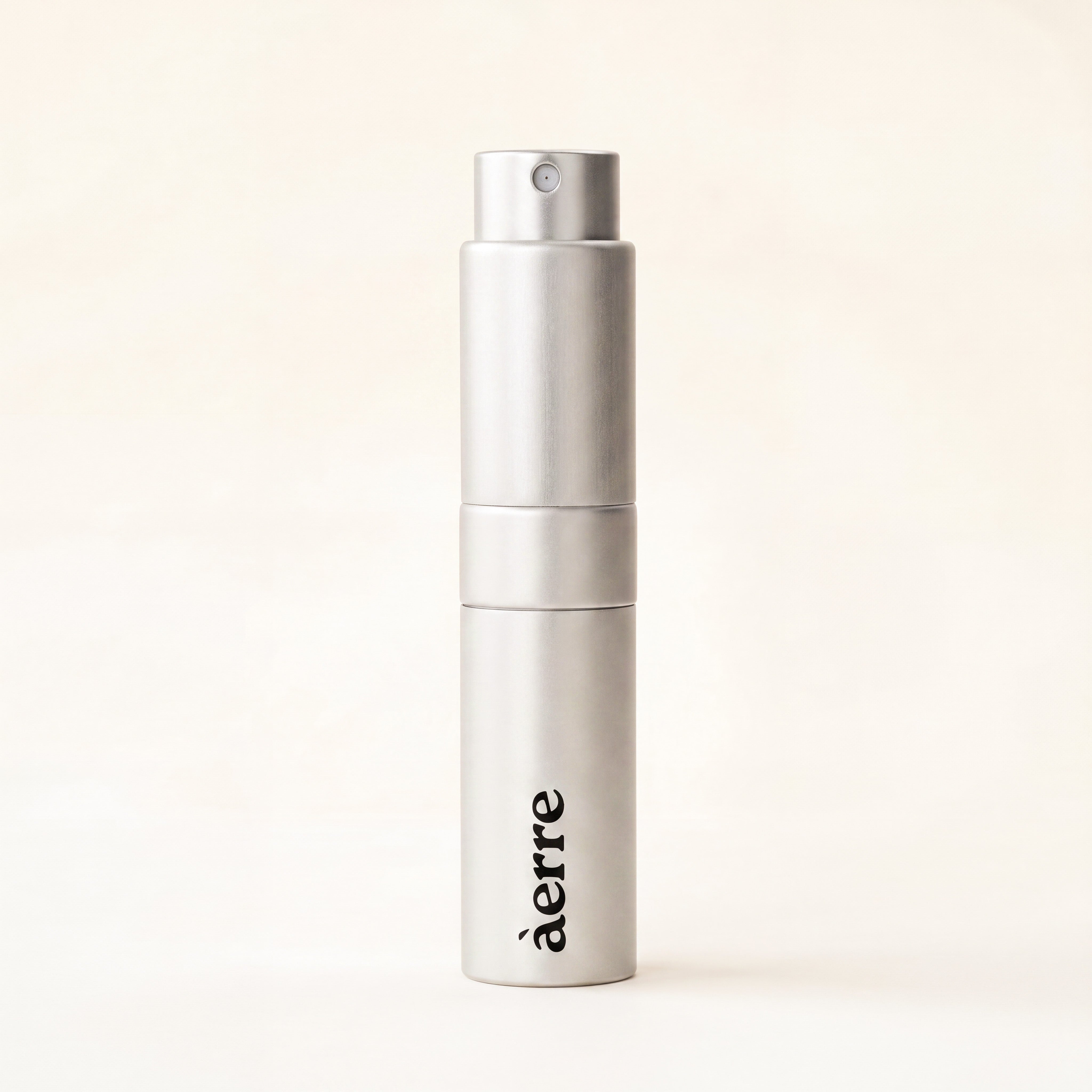 Silver Aerre perfume atomiser on a white background