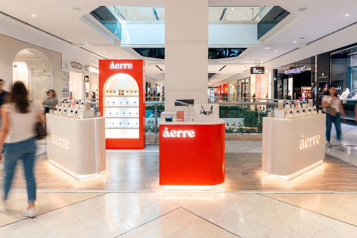 Àerre retail store interior with red and white display units. Located in Westfield Parramatta.
